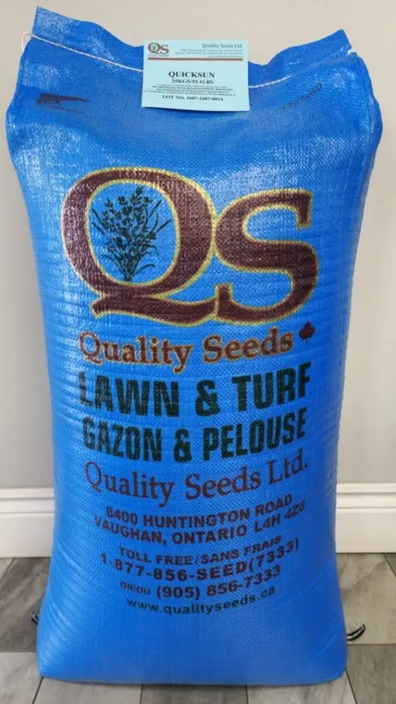 A blue bag of Quality Seeds Ltd. for lawn and turf. Contact details and address in Vaughan, Ontario are printed on it.